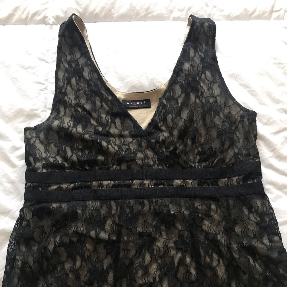 Sleeveless Black and Tan lace top.